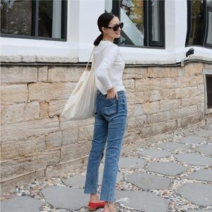Blue Straight Leg Jeans with Vintage-Inspired Fading
